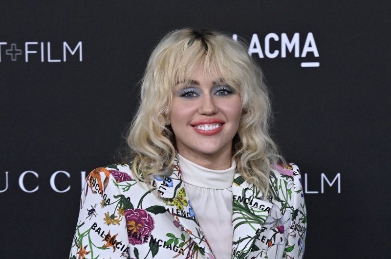 Miley Cyrus sets streaming record with Flowers single Miley Cyrus Blossoms Takes off High On Spotify