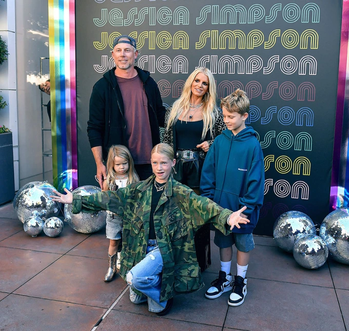 jessica simpson in leather romper with kids mega 1 Jessica Simpson holds her 3-year-old daughter Birdie in adorable photos and reveals the toddler's singing abilities.